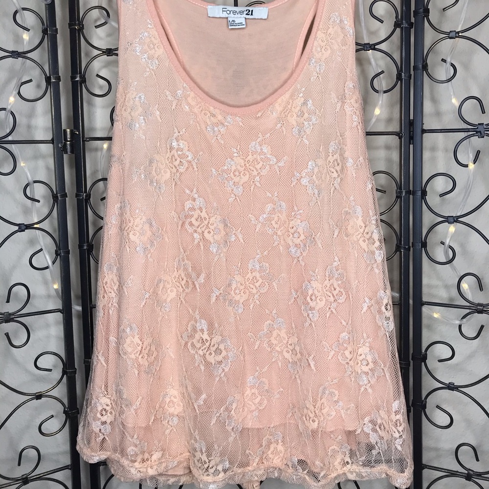 Peach colored tank top with lace detailing
